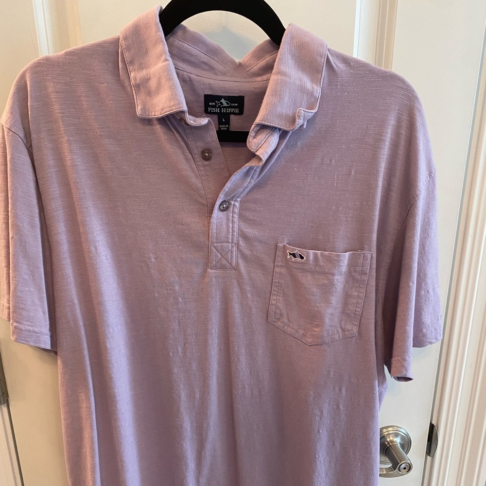 Fish hippie brand polo shirt in like new condition. Light purple. 100% cotton.